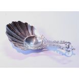 Silver scallop caddy spoon with pierced grip, by Bradbury & Sons, Sheffield 1915.