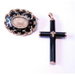 Victorian gold mourning brooch and a similar mounted onyx cross.  (2)