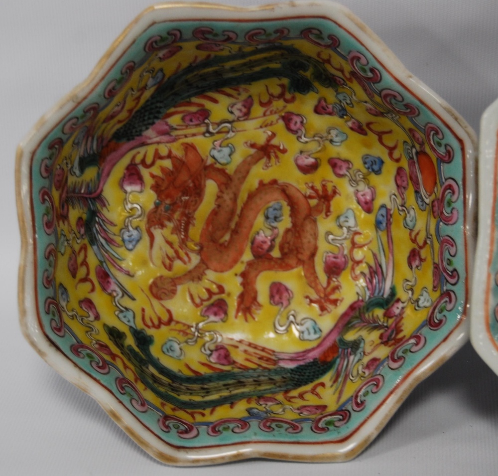 Three Chinese porcelain Qianlong (1711 - 1799) famille rose octagonal bowls, red seal mark to the - Image 5 of 12