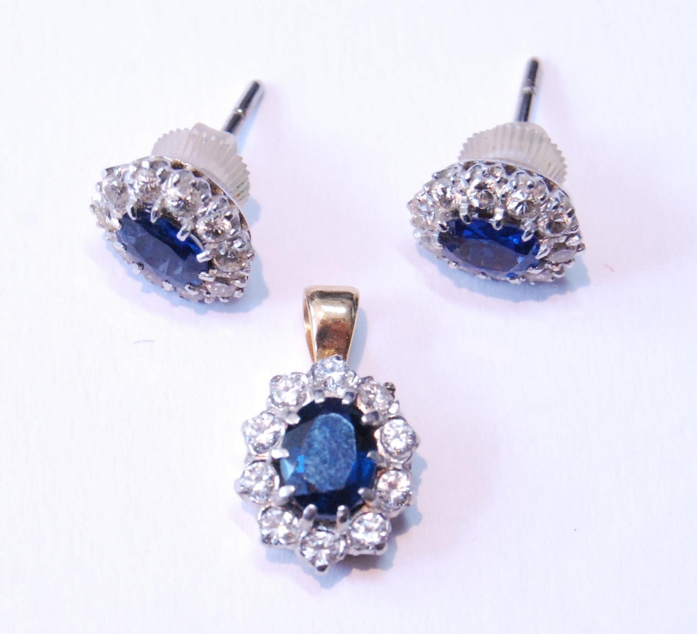 Pair of sapphire and diamond cluster earrings, unmarked, probably white gold, with central oval- - Image 2 of 5