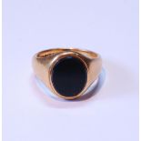 22ct gold signet ring with plain oval bloodstone, 9.7g gross, size N.