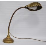 Art Deco brass 'shell' desk lamp, the shade supported upon a brass adjustable gooseneck arm on a