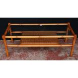 G Plan teak coffee table in the Japanese taste with bamboo-effect frame above a bergère undertier,