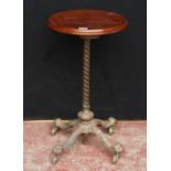 Victorian cast iron and brass machinist's table, the saucer-shaped mahogany top on an extending