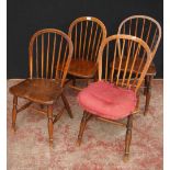 Set of four antique ash and elm Windsor-type chairs, each with a hoop frame and stick back, peg
