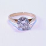 Diamond solitaire ring, the brilliant approximately 2.7ct, in platinum and 18ct gold, size V.