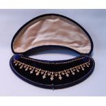 Victorian gold and pearl fringe necklet with spear-shaped drops, probably 15ct, 42cm, 30.4g gross,