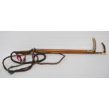 Two George VI period riding crops by Swaine & Adeney, London, both with maker's button to the antler