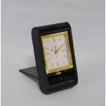 Jaeger-LeCoultre timepiece/travel clock with silvered signed dial and gilt baton markers, 11cm high,