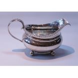 Silver milk jug of boat shape, by John Walton, Newcastle 1823, 159g or 5oz.