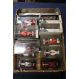 Sixteen 1:43 scale model vehicles to include Hotwheels Racing 55602 Ferrari 2001 Constructors