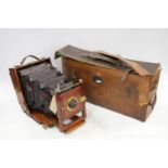 Early 20th century mahogany and brass folding bellows plate camera with W.A.R. Back lens and