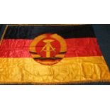 German Democratic Republic political works flag with compass and hammer in wreath design, the