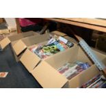 Four boxes of a extensive collection of Dr Who magazines, books, annuals, comics, etc.