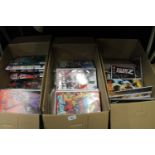 Three boxes of a extensive collection of DC Comics to include Batman and Robin, Catwoman, (Over