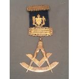 9ct gold Masonic jewel in the form of a compass and square 17g on a blue ribbon with mounts '