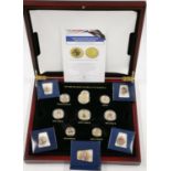The London Mint Office The Changing Face of Britain's Coinage cased coin set and an album of
