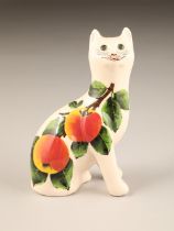 Griselda Hill pottery Wemyss cat figure, with hand painted apples, signed to base, height 18cm