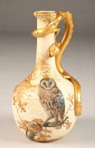 Royal Worcester ewer, bottle shaped with scaled surface, large gilt serpent handle, decorated with a