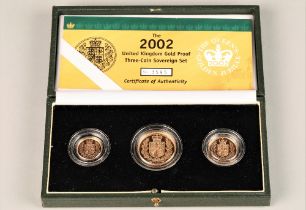 The 2002 United Kingdom gold proof three coin sovereign set, consisting of two pound coin, sovereign
