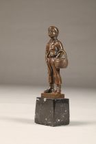 EB Morty (German 20th century) bronze figure of a smoking boy with basket, height 16cm