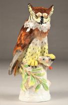 Dresden porcelain fish owl figure, finished in brown and yellow, stamped Dresden, height 35.5cm