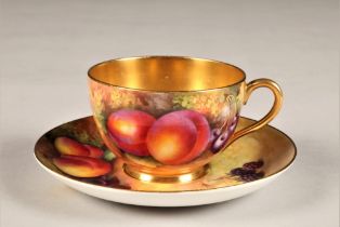 Royal Worcester cup and saucer, hand painted fruit in a naturalistic background, signed Townsend and