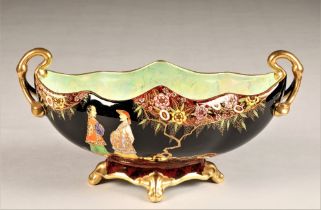 Carlton ware centre bowl, gilt handles, mandarins chatting pattern, raised on four gilt feet, height