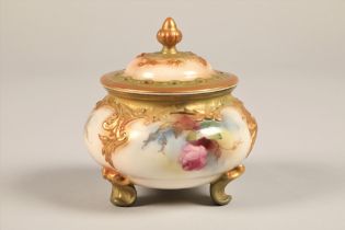 Royal Worcester pot pouri dish and cover, raised on three scroll feet, decorated with hand painted