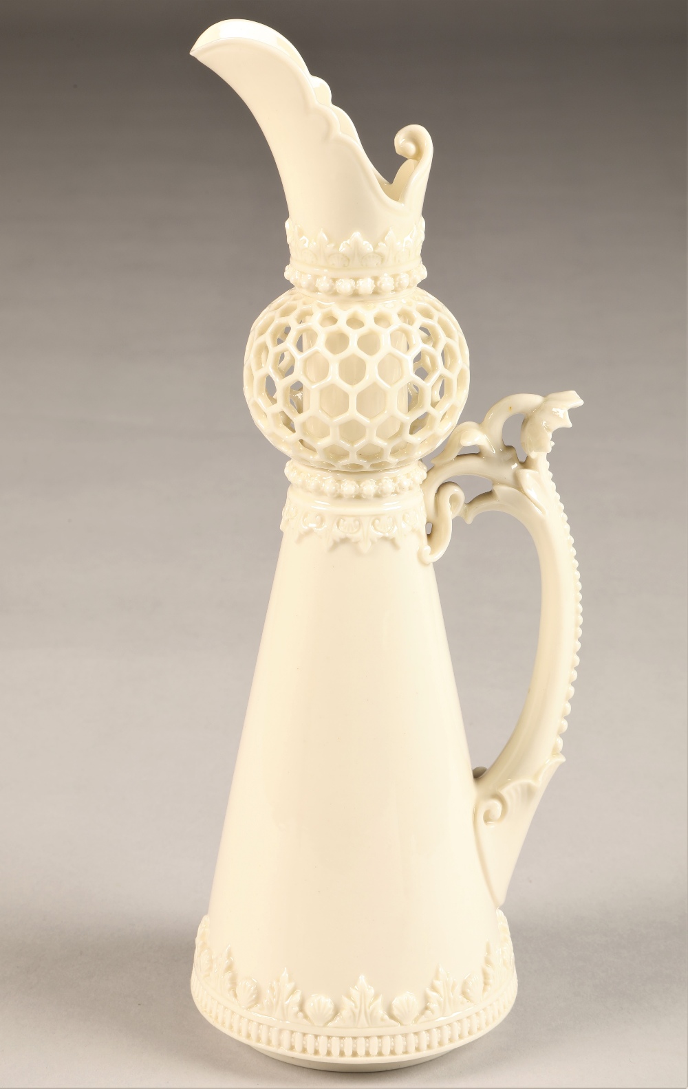 Royal Worcester ewer, tapered cylindrical form, reticulated spherical neck, scroll handle 'Blanc