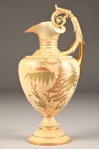 Large Royal Worcester ewer, raised on a circular foot with scroll handle, decorated with hand