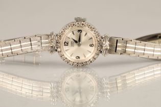 Ladies 9ct white gold Tudor royal wrist watch, silver dial with hour markers with numbers at every
