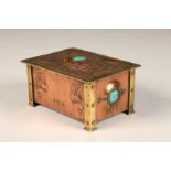 McVitie and Paige arts and crafts brass and copper biscuit box with a lock and key, green velvet