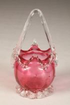 Victorian cranberry glass basket, clear glass handle and pinched foot, height 26cm