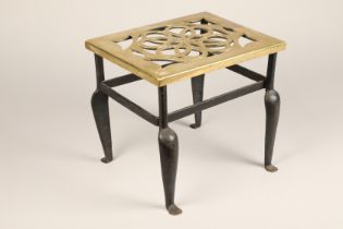 Brass topped trivet stand, pierced rectangular brass top fixed to a wrought iron base, length