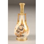 Royal Worcester twin handled bottle shaped vase, decorated with hand painted hoopoe, No 924, date