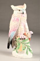 Dresden porcelain fish owl figure, finished in pinks, stamped Dresden, height 32cm