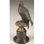 After Archibald Thorburn (Scottish 1860-1935) Bronze figure of a perched golden eagle, on a marble