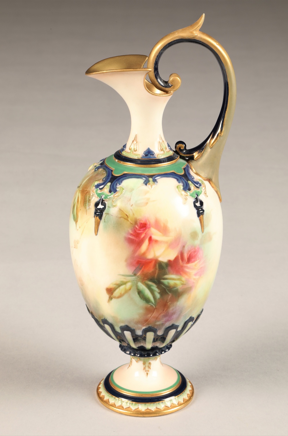 Hadley's Worcester ewer baluster form, scroll handle raised on a circular foot, hand painted with