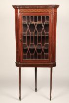 Edwardian inlaid mahogany glazed corner cabinet on stand, height 181cm