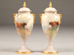 Pair Royal Worcester vases and covers, baluster form, gilt twin handles, raised on circular feet,