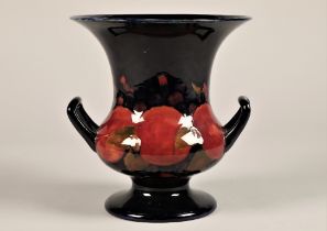 Large Moorcroft pottery campana vase, decorated with pomegranate pattern, signed and incised