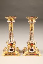 Pair Royal Crown Derby bone china candlesticks, decorated in the imari pattern, height 27cm