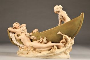 Art Nouveau Bohemia Royal Dux porcelain figure, centre piece modelled as a young fisherman