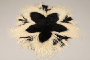 Colobus monkey skin rug, diameter 90cm