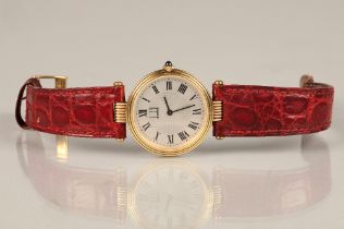 Ladies 18ct yellow gold Dunhill wrist watch, silver dial with roman numeral hour markings on a