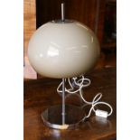 Mid-20th century chromed metal table lamp with beige circular plastic shade in the manner of