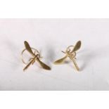 Pair of 9ct gold damselfly napkin holders, 3cm,  5.3g.