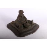 Early 20th century cast iron inkwell in the form of Daniel Lambert The Glutton / Worlds Fattest