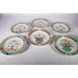 Set of 18th Century Chinese porcelain plates with green scroll border and flower panels, also two